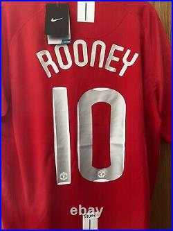 100% authentic WAYNE ROONEY Signed Manchester United 2008 champions league final