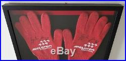 1990 McLaren pit crew gloves signed by Ayrton Senna