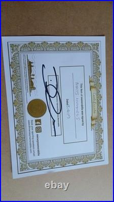 2 framed signed shirts with coa