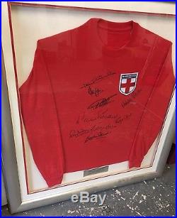 Framed England Shirt hand signed by 9 of the 1966 England World Cup Winning Team