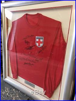 Framed England Shirt hand signed by 9 of the 1966 England World Cup Winning Team