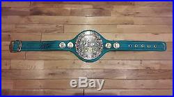 Full size WBC Emerald boxing belt, signed by Manny Pacquiao and Freddie Roach