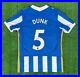 Lewis_Dunk_Signed_Brighton_Hove_Albion_2021_22_Home_Shirt_01_pl