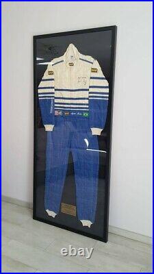 OMP race suit hand signed by Ayrton Senna