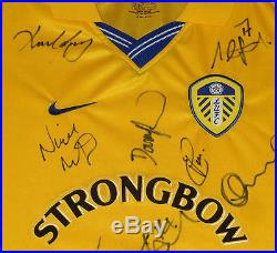 Professionally Framed Leeds United 2000-01 Champions League Squad Signed Shirt